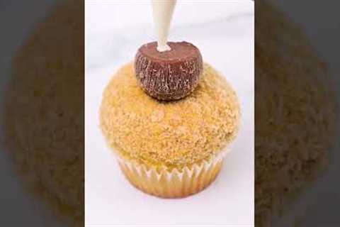 The perfect beach day includes a coconut drink and a cupcake!